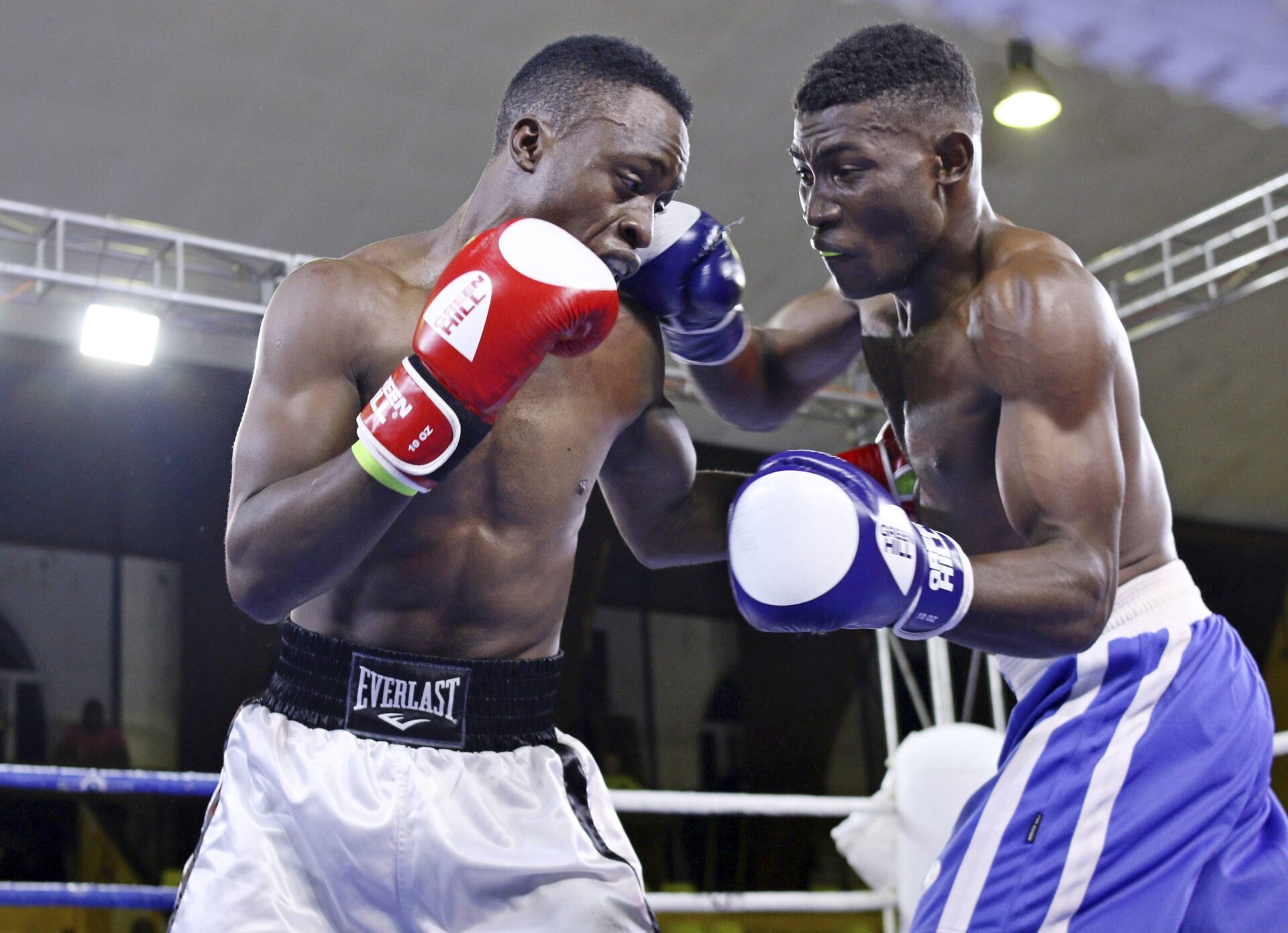 Umar-Nvule-of-Sparks-Blue-against-Simon-Sande-of-Nansana-boxing-club-in-the-Welter-Weight-67kgs-of-the-Champions-league-at-Lugogo-Photo-by-John-Batanudde-30-scaled (1)